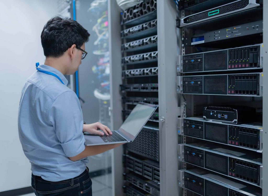 Computer,Engineer,Is,Setting,Up,Network,In,Server,Room,systems,Maintenance